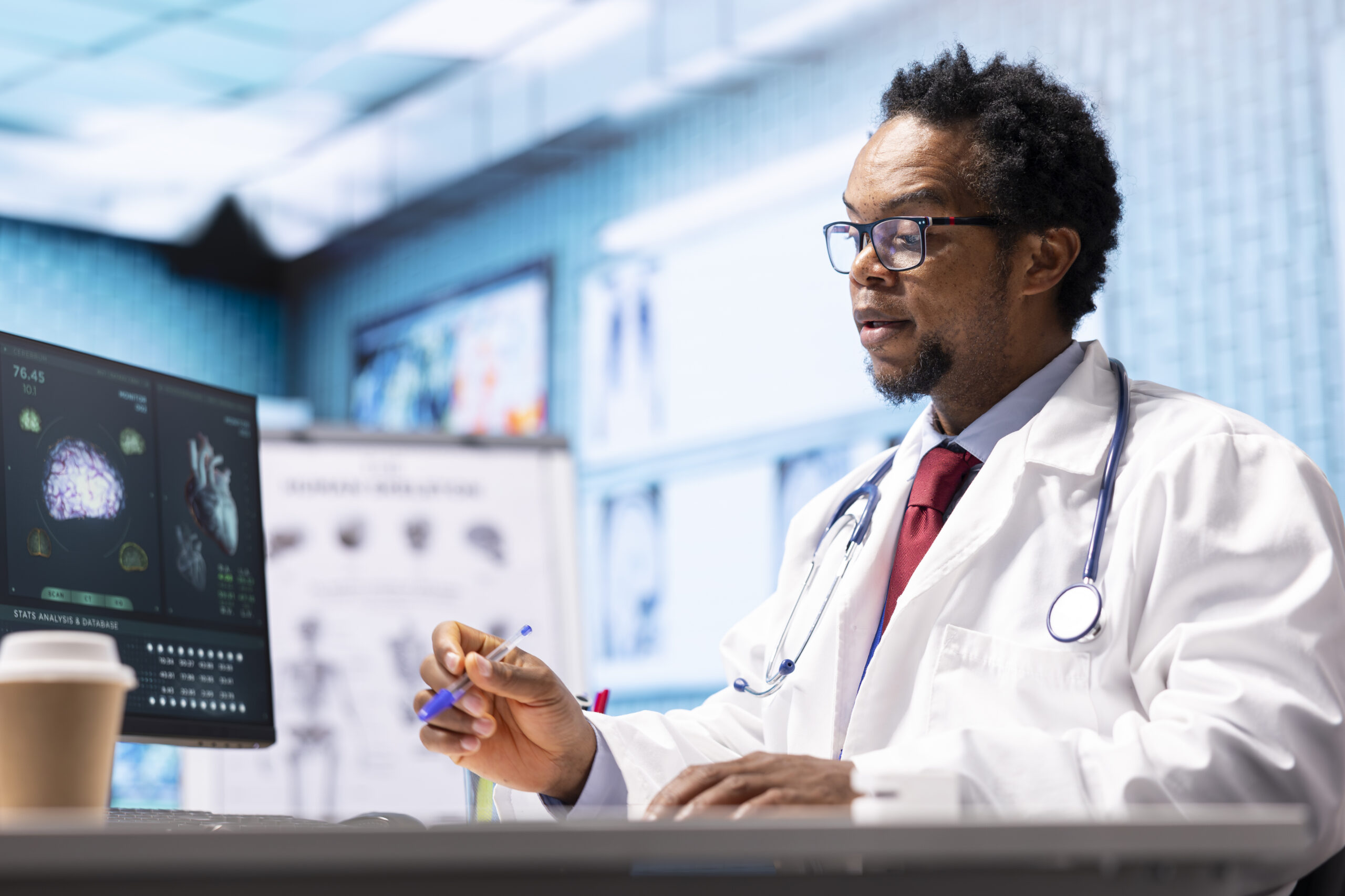 African american doctor explaining diagnostic report to female patient